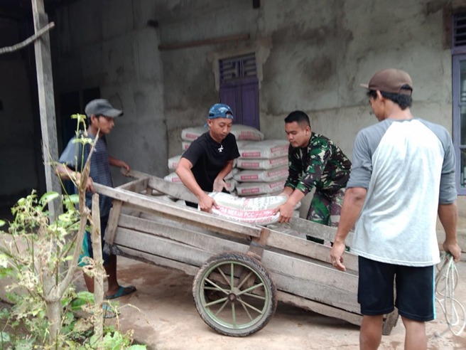 Gotong Royong Warga dan Tim Satgas TMMD